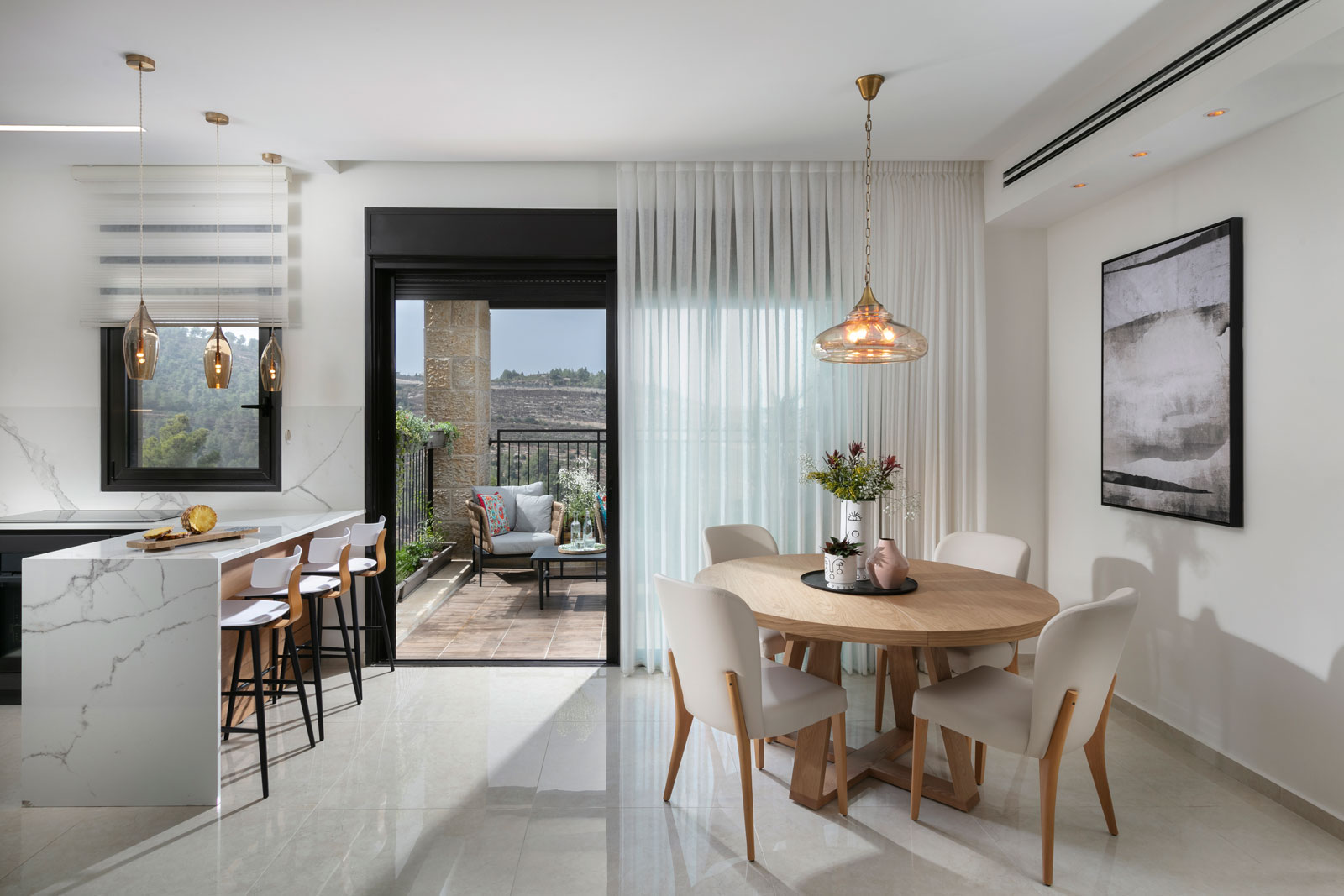 Modern home with round dining area and kitchen island
